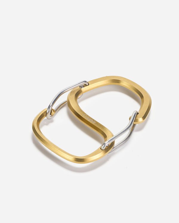 Gold and silver hoop carabiner on a white background