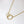 Gold necklace with interlocking rings on a white background