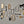 Collection of various keys and metal objects on a gray background