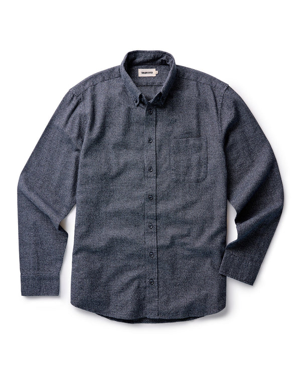 Dark navy and gray button-up shirt on a white background